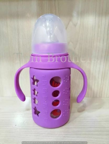 صورة رضاعة أطفال زجاجية بغطاء سيليكون 120 مل